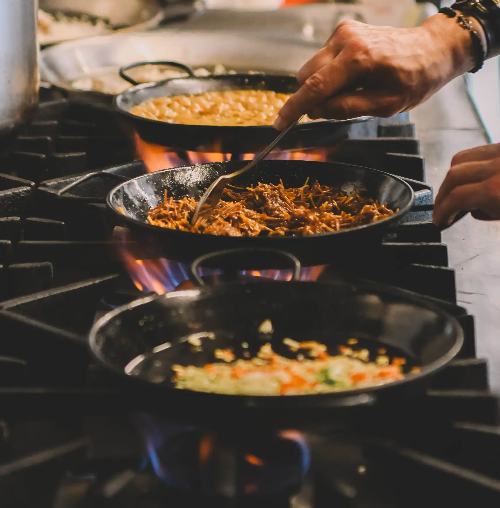 Gourmet restaurant kitchen where rice dishes are cooked