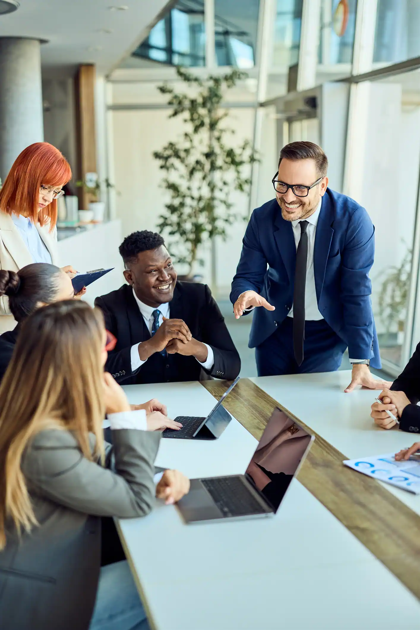 Professional Business Team Collaborating During a Meeting in a Modern Office Setting