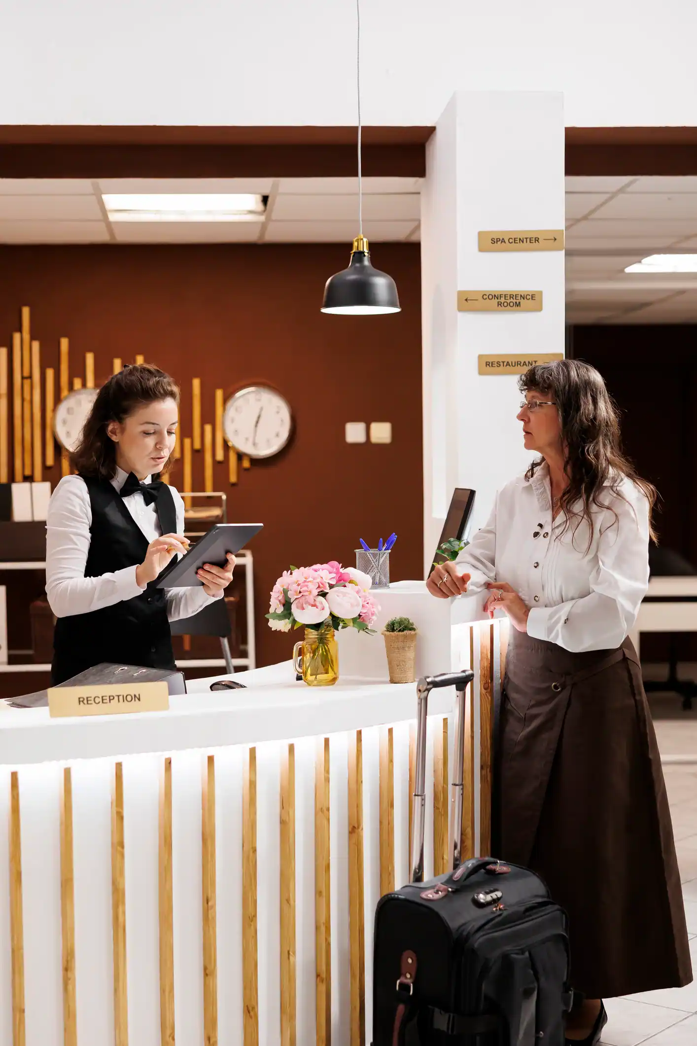 Smooth check-in for elderly hotel guest